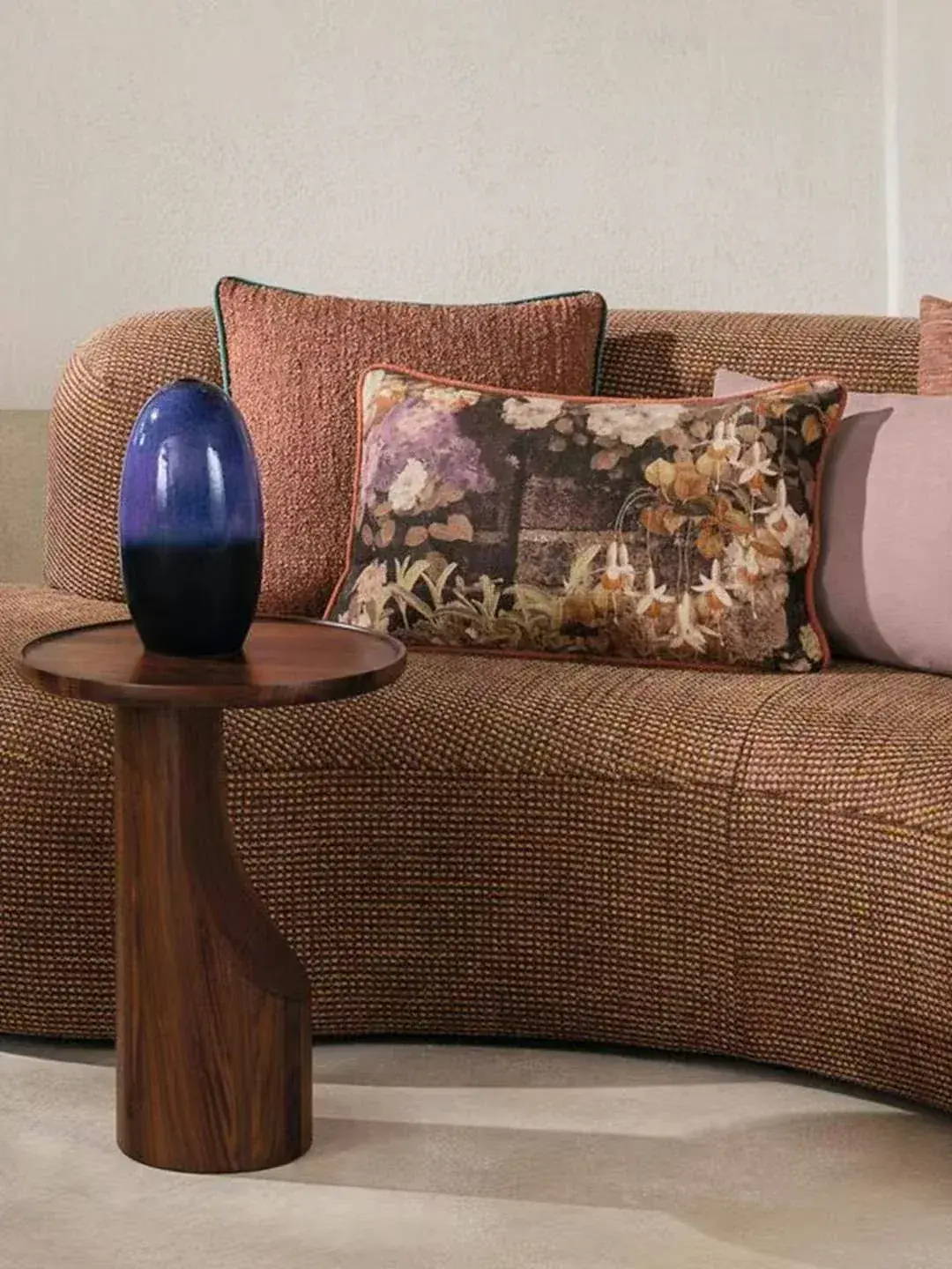printed cushion and sofa grouping