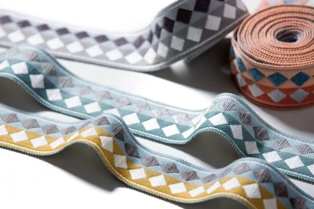 Close-up of colourful geometric woven braid trims