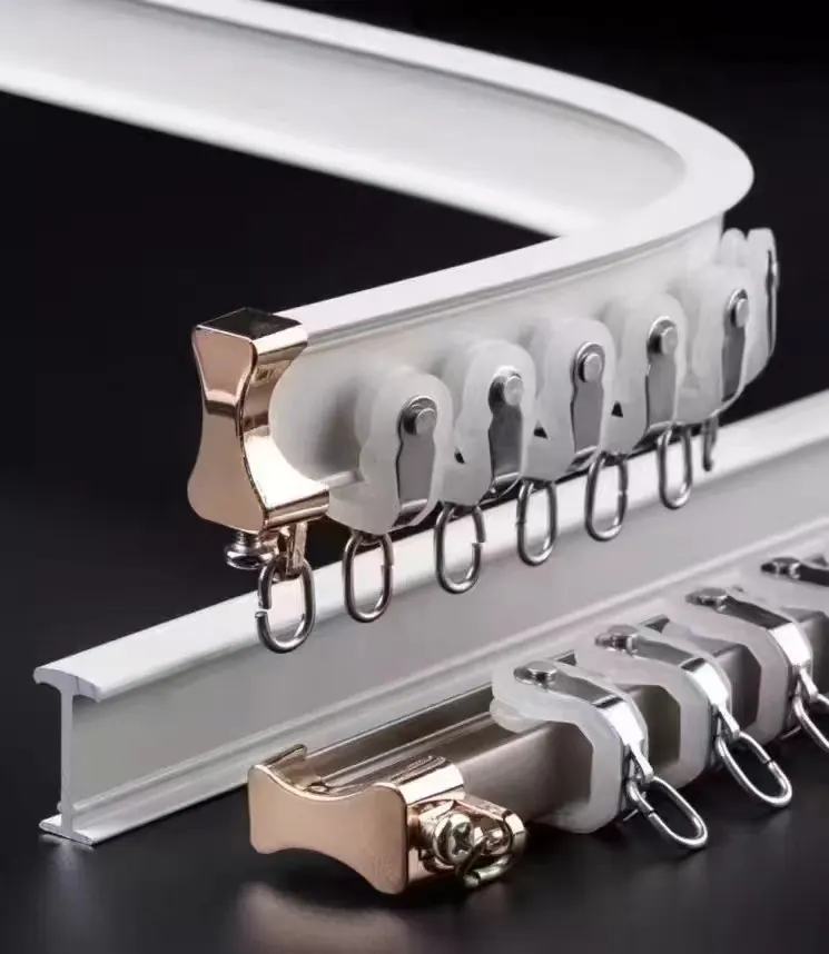 Curtain track profiles and carriers